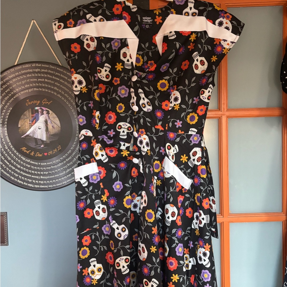 Unique Vintage Black Dress with Floral Accents